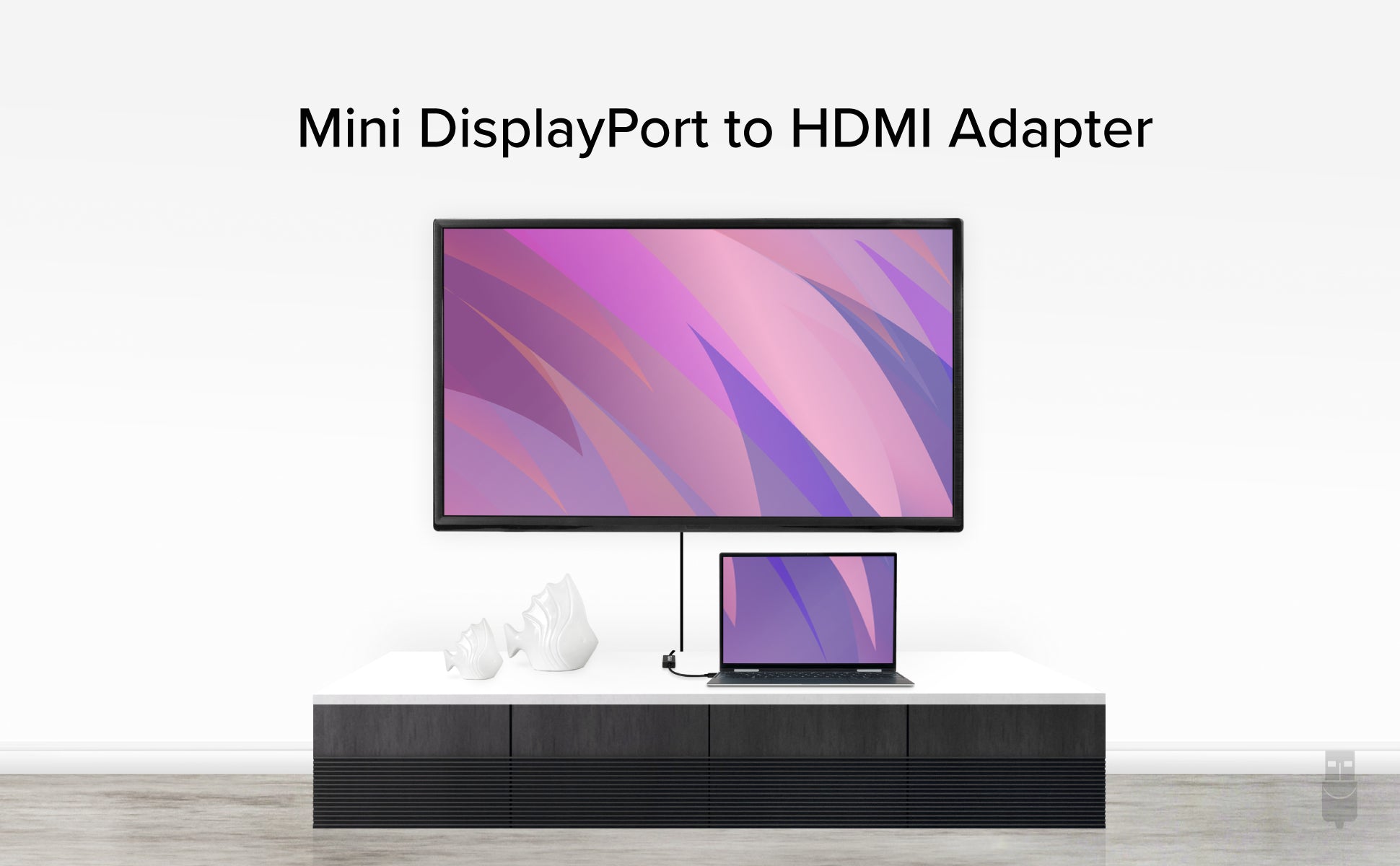 Mini DisplayPort to HDMI connecting a notebook to wall mounted television