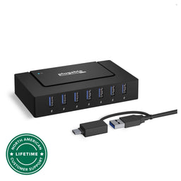 Plugable 7-port USB 3.0 hub with charging icons, power LED, and attached USB-C to USB-A adapter cable.