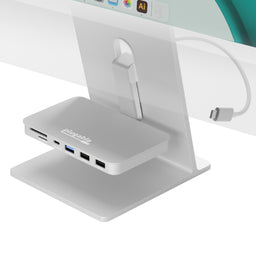 Plugable AD-6IN1 hub with Micro SD/SD, USB-C 10Gbps, USB 3.0 10Gbps, and two USB 2.0 ports attached to an iMac stand.