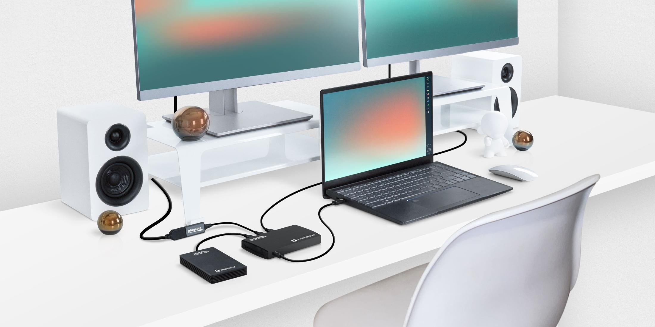 Image of a setup with a laptop and a TBT4-HUB3C connected to peripherals