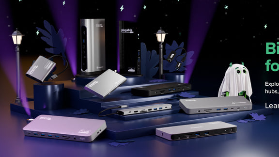 Big Deals for Your Setup: Explore savings on docking stations, USB-C hubs, adapters, cables, and more. Plugable docks and hubs are arranged on a stage with a small ghost character, in a Halloween-themed scene.