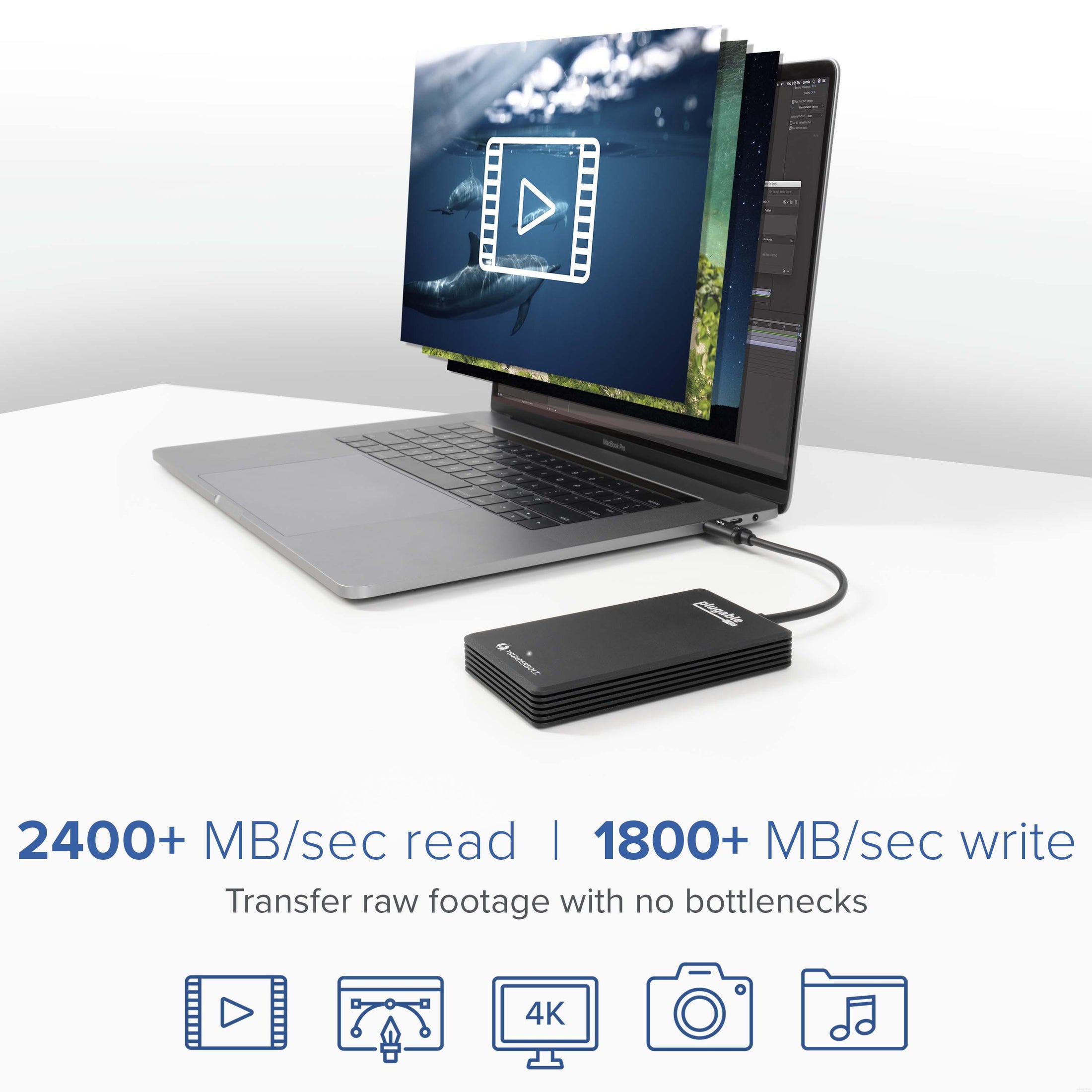 Plugable TBT3-NVME1TB SSD connected to laptop, showing 2400+ MB/sec read and 1800+ MB/sec write performance speeds.