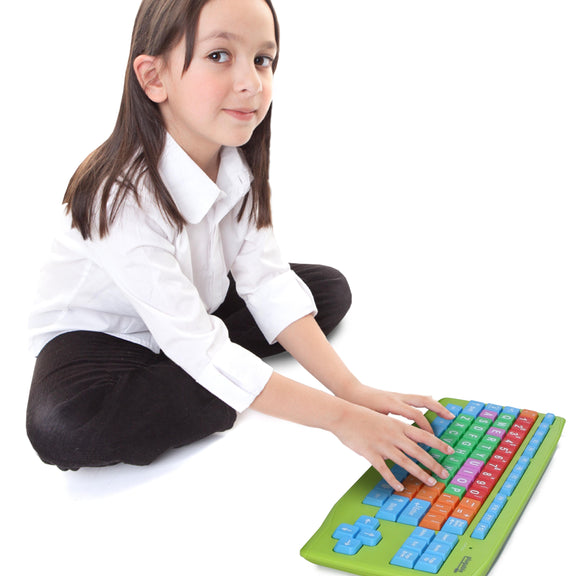 Image of a child sitting and using the Plugable USB-EZK-G Kids Keyboard