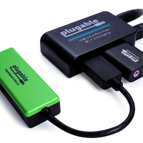 An image showing a SD card adapter connected to the usb2-hub4bc as well as an USB audio adapter.