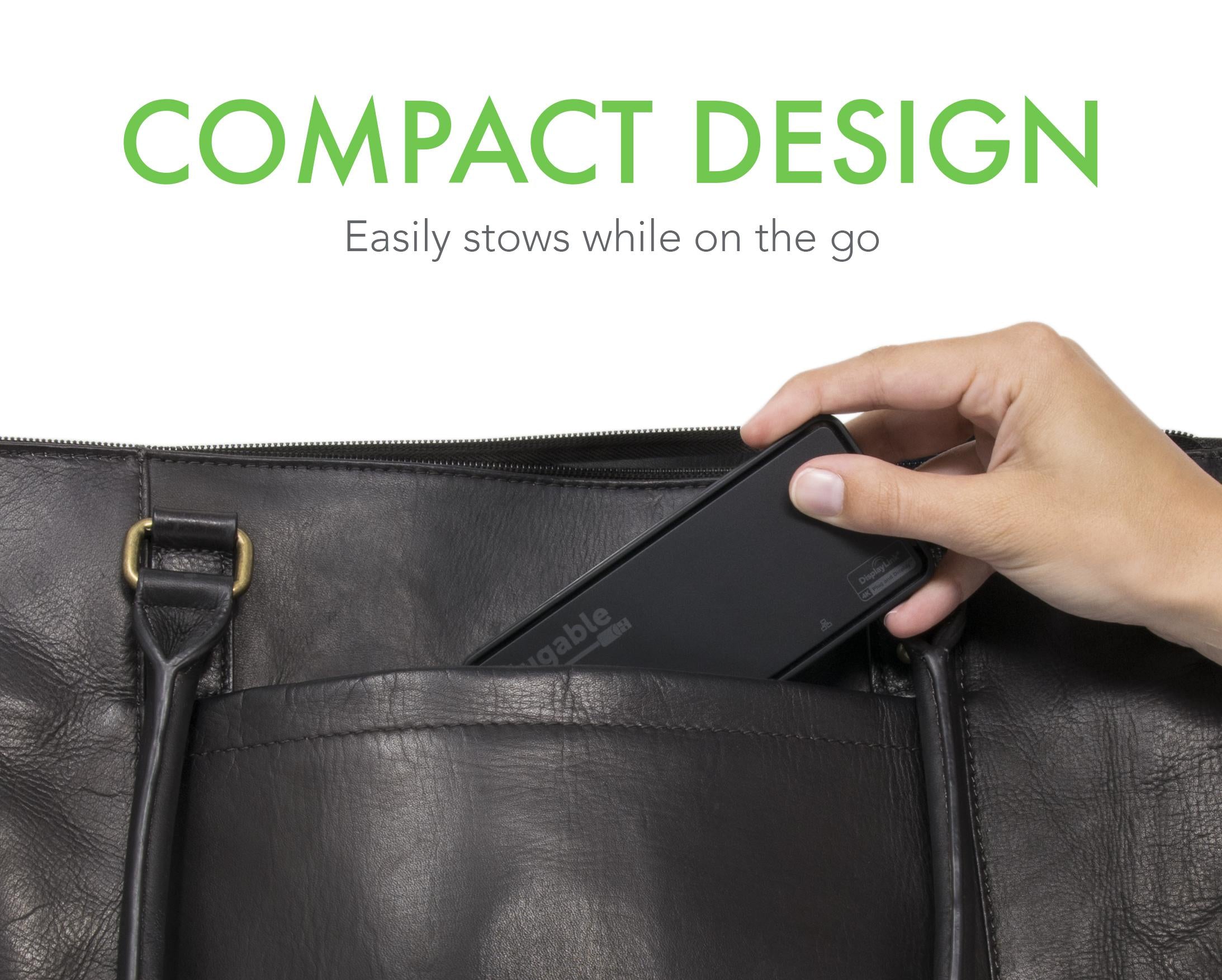 Hand placing the Plugable USBC-6950-HDMI adapter into a bag pocket to demonstrate its compact, portable design.