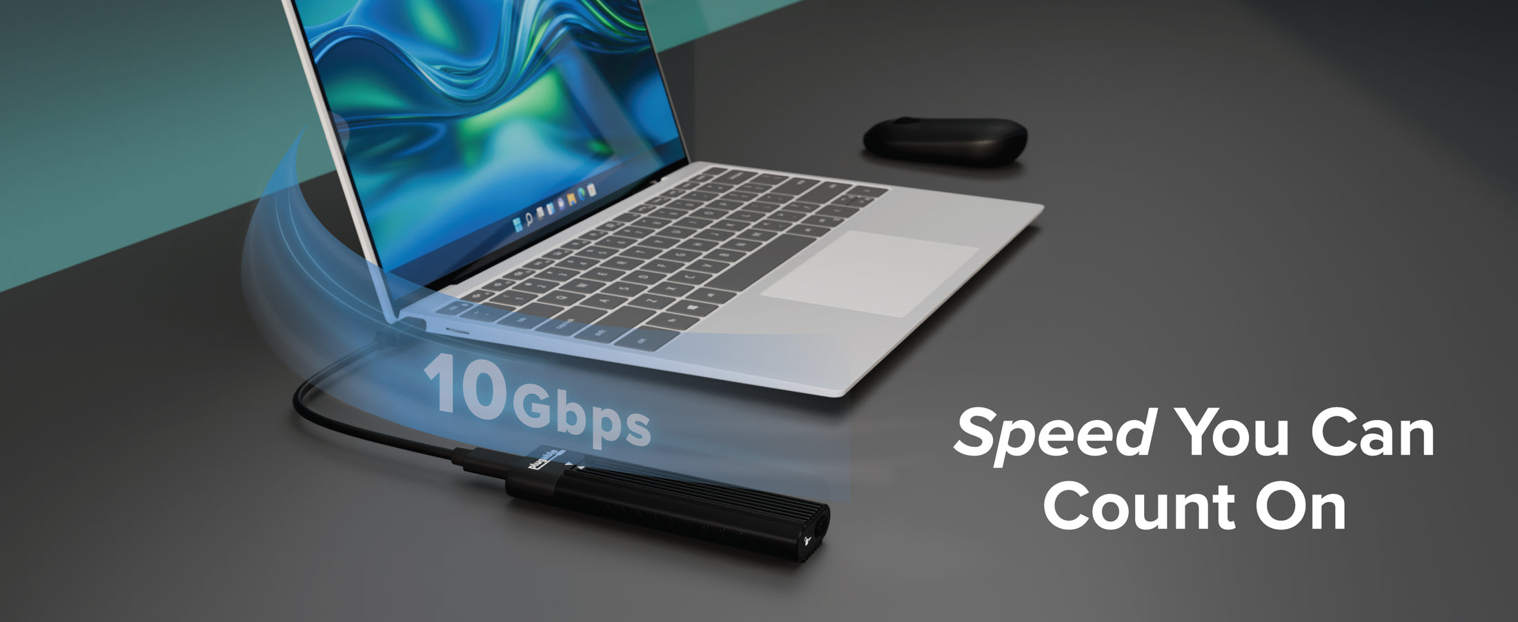 m.2 enclosure connected to laptop showing 10Gbps speed with “Speed You Can Count On” text