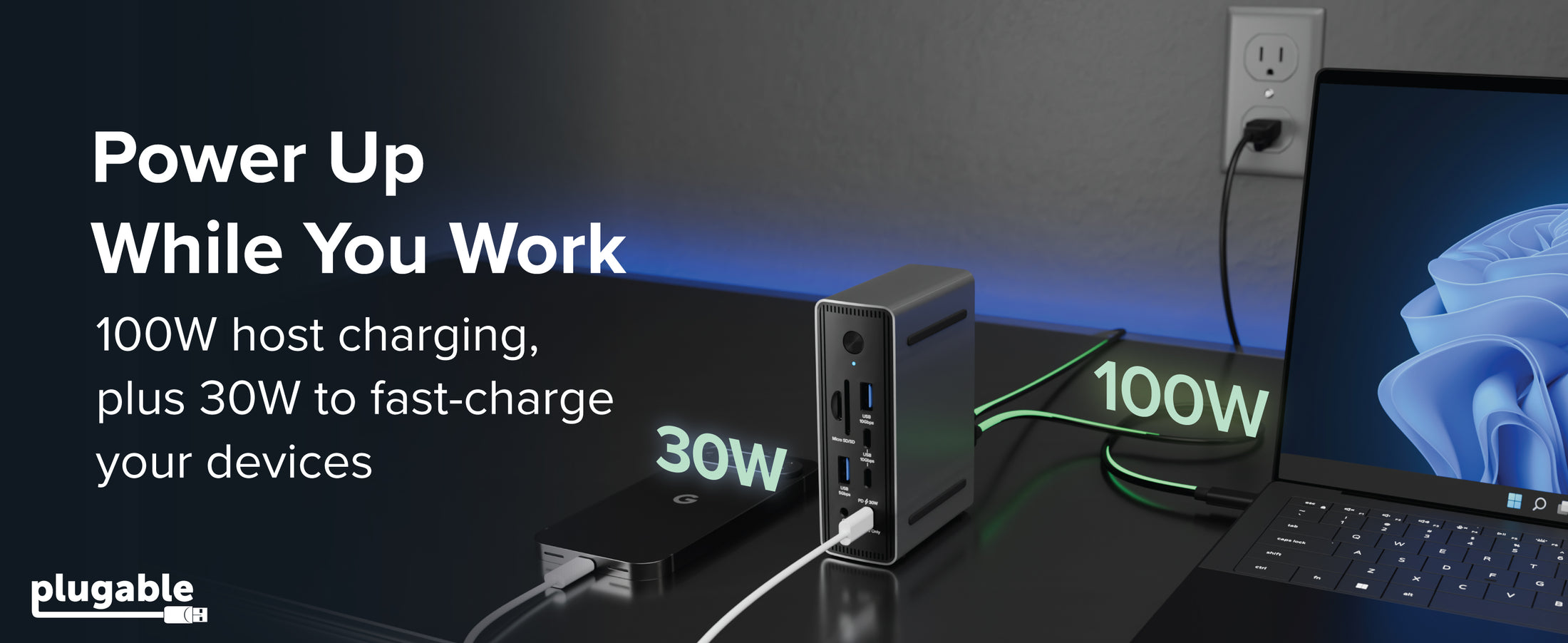Plugable 100W USB-C dock powering a laptop and 30W phone with Power Up While You Work text