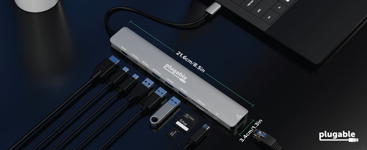 Plugable hub with cables, SD card, and Ethernet port, text "21.6cm/8.5in"