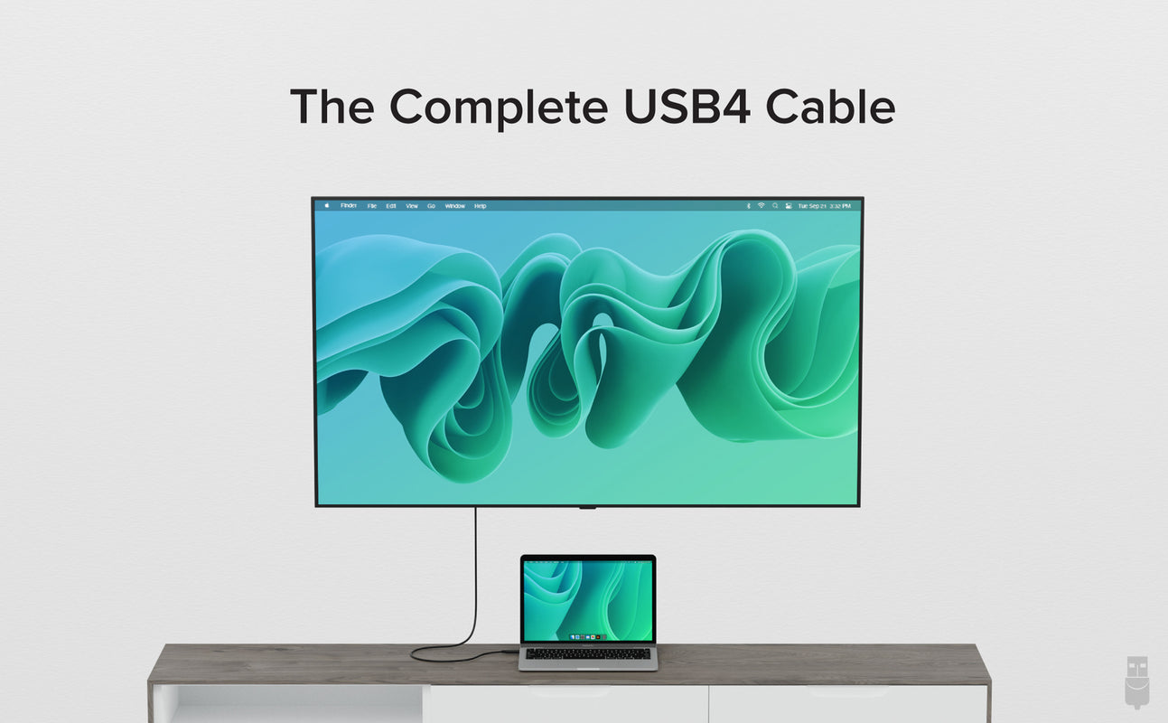 USB4 cable connected between laptop and large screen