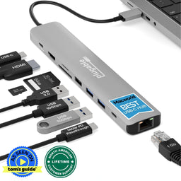 Plugable 9-in-1 USB-C Hub with HDMI, USB 10Gbps, SD, Micro SD, Ethernet, and 140W PD Passthrough connected to a laptop.