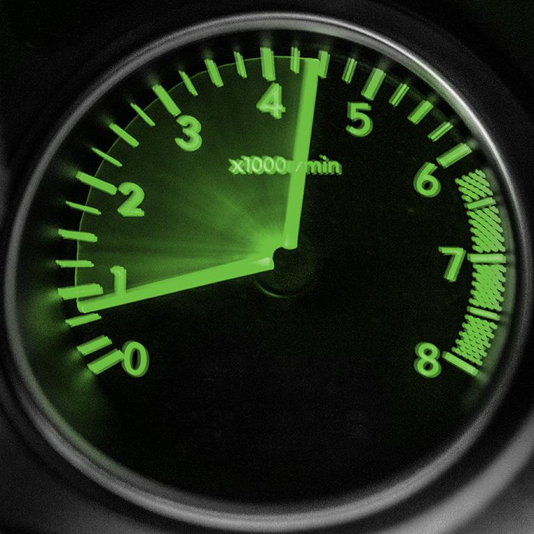 Image of a speedometer dial moving very fast